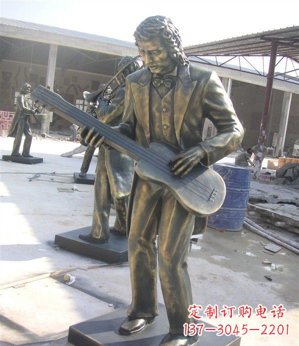 郑州西方人物铜吉他雕塑