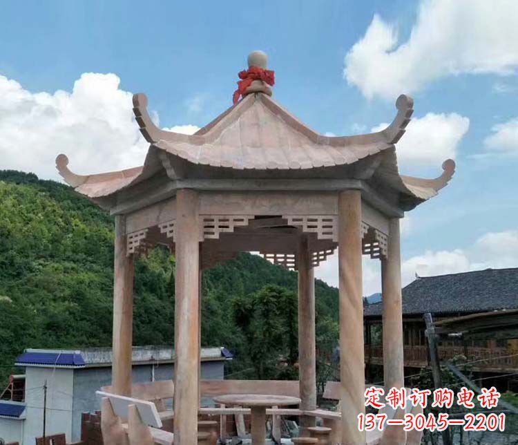 郑州一流的公园晚霞红六角石雕凉亭