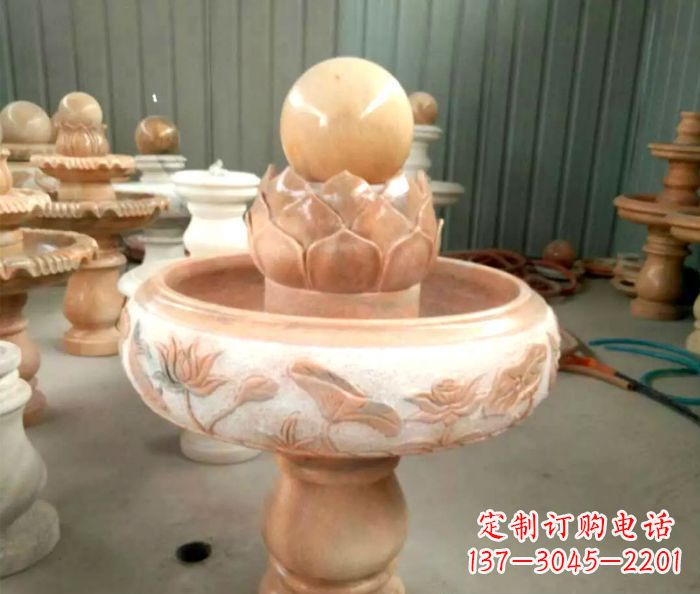 郑州石来运转晚霞红风水球喷泉石雕