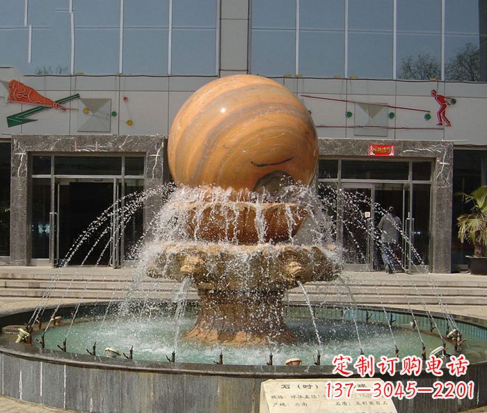 郑州石来运转球晚霞红风水球石雕