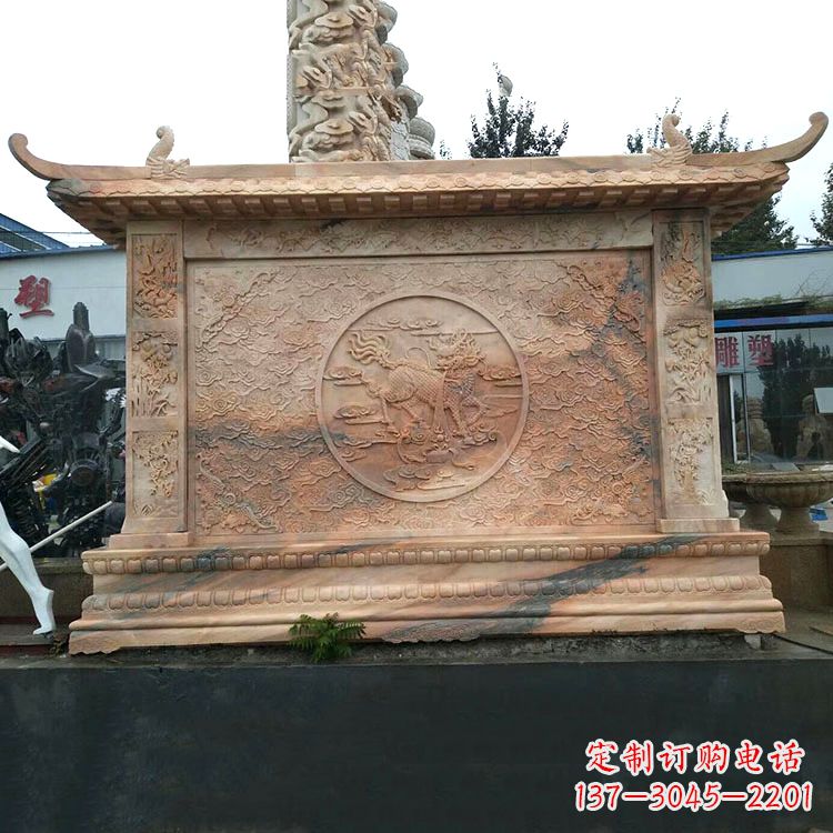 郑州晚霞红麒麟影壁墙石雕