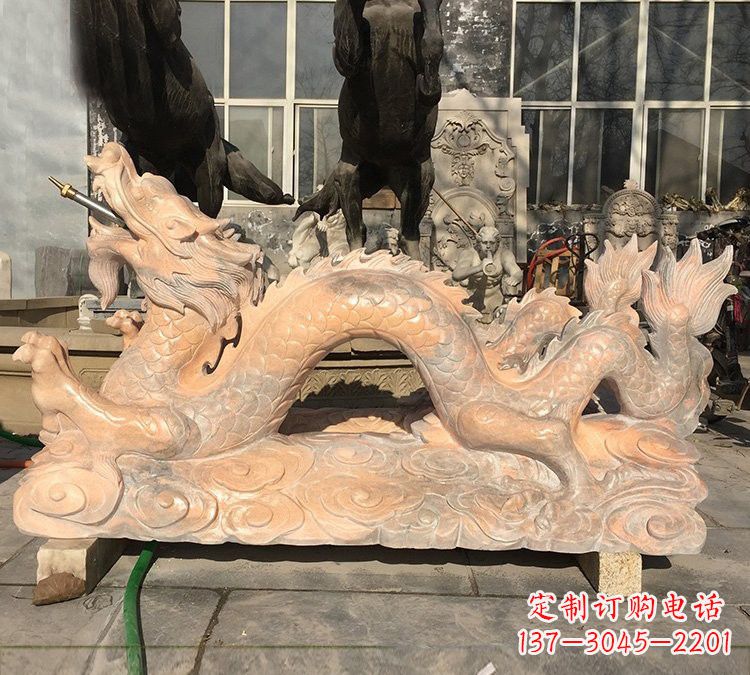 郑州晚霞红石雕喷水龙