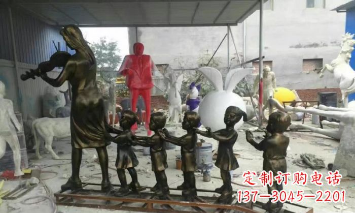 郑州校园老师和儿童铜雕